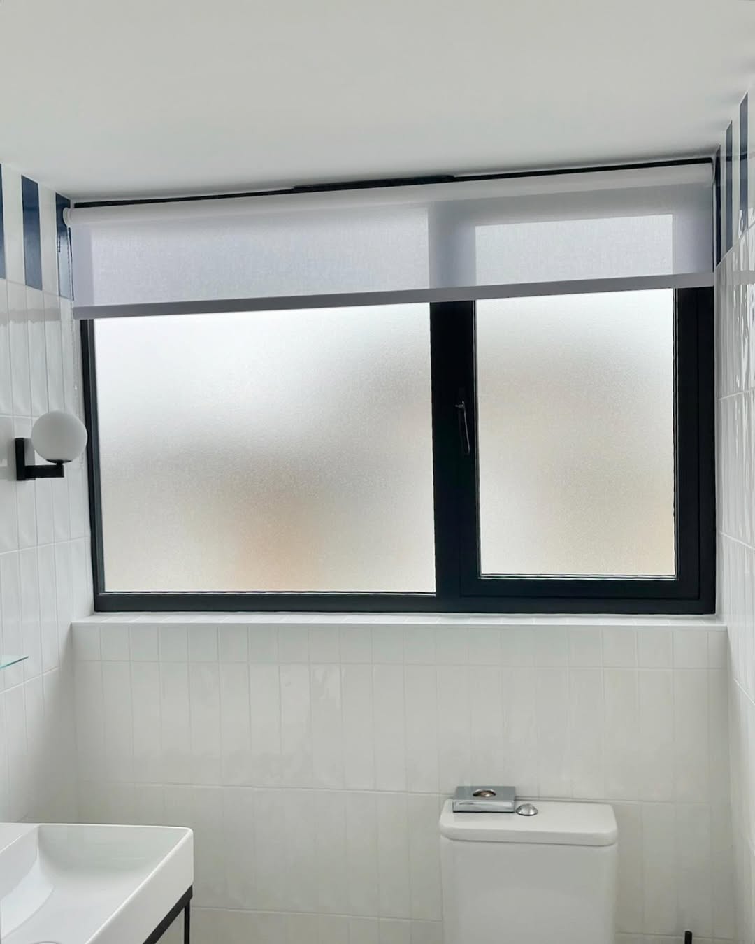 Roller blind in a modern bathroom