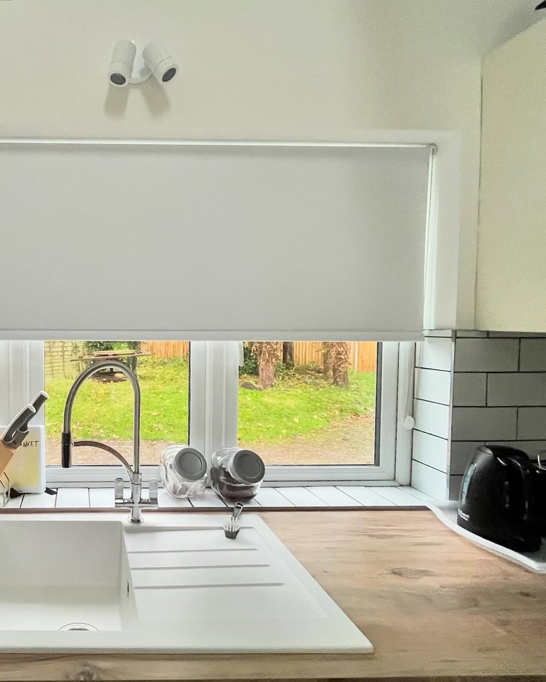 White roller blind in a modern kitchen