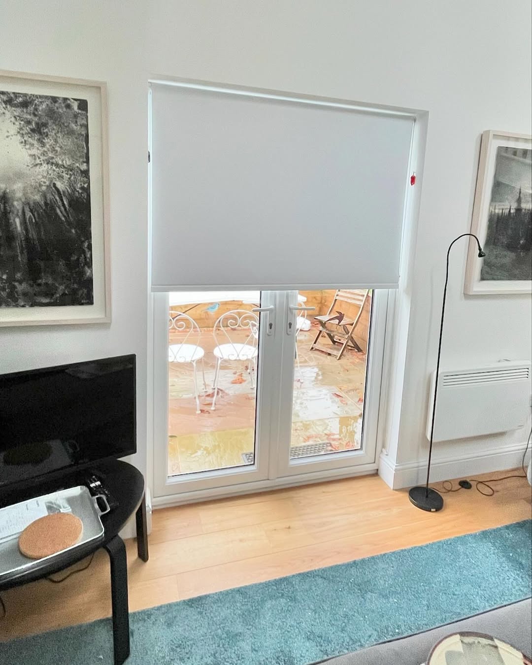 Roller blind on patio doors in living room