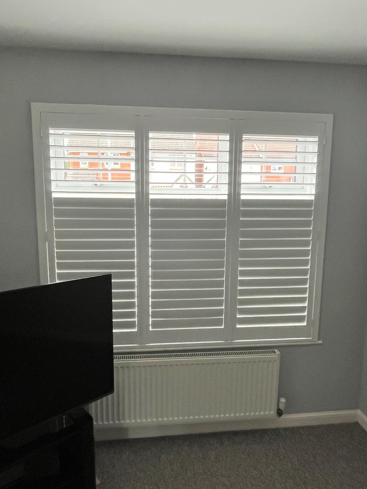 Grey bedroom shutters